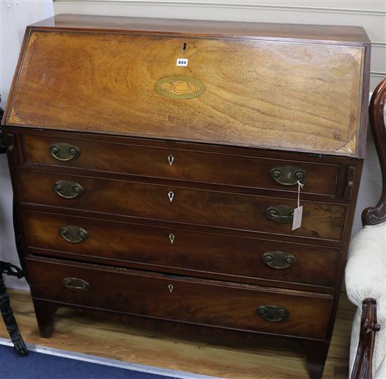 A George III mahogany bureau, W.106cm